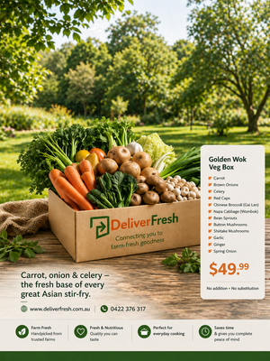 DeliverFresh Golden Wok Veg Box with fresh vegetables on a wooden table outdoors.
