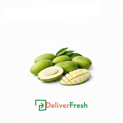 Green mangoes with a halved mango with DeliverFresh.
