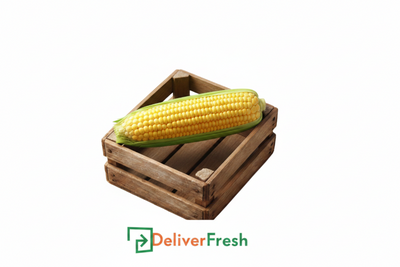 Wooden crate with sweet corn and 'Deliver Fresh'