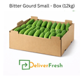 Box of bitter gourds with 'Deliver Fresh'