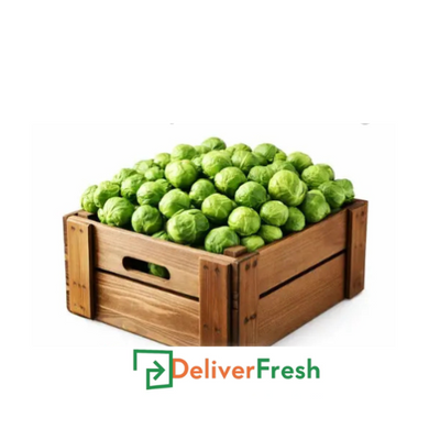 Wooden crate filled with Brussels sprouts with 'Deliver Fresh' 