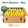 Fresh horn bananas packed in a wholesale box for bulk supply by DeliverFresh