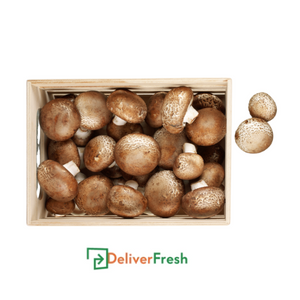 Box of brown swiss mushrooms with 'Deliver Fresh'