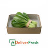 Bunch of Shanghai Bok Choy in a cardboard box with DeliverFresh logo.
