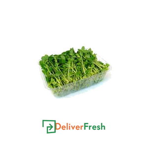 Box of snow pea tendrils with DeliverFresh