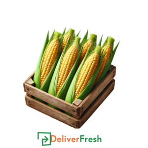 Three ears of sweet corn in a wooden crate with 'Deliver Fresh' 