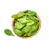 A wooden bowl filled with fresh baby spinach leaves, isolated