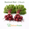 Fresh red beetroot two bunches with green leaves supplied by DeliverFresh