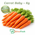 Fresh baby carrots sold per kilogram, vibrant orange carrots with green tops