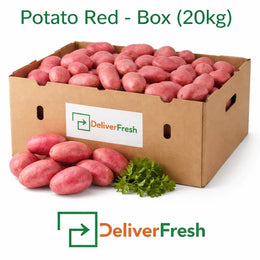 Fresh red potatoes packed in a 20kg box on a pure white background by DeliverFresh