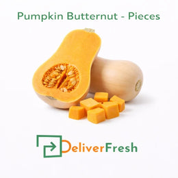 Fresh butternut pumpkin pieces cut and whole by DeliverFresh