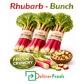 Fresh rhubarb bunch in Melbourne, crisp red stalks with green leaves for wholesale delivery