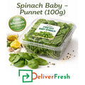Fresh baby spinach in a 100g punnet, crisp green leaves packed for premium vegetable supply