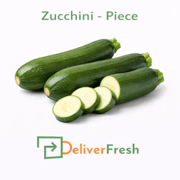 Fresh zucchini piece whole and sliced by DeliverFresh